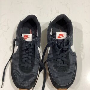 Nike Black and White Retro Sneakers with Iconic Design